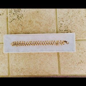 Gold and silver tone link bracelet